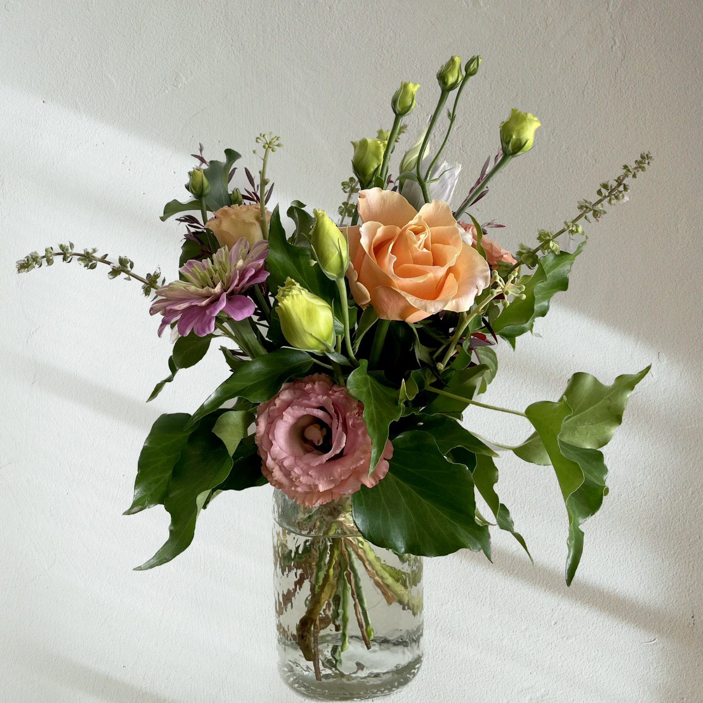 Jar of fresh flowers delivered by Bendigo Florist