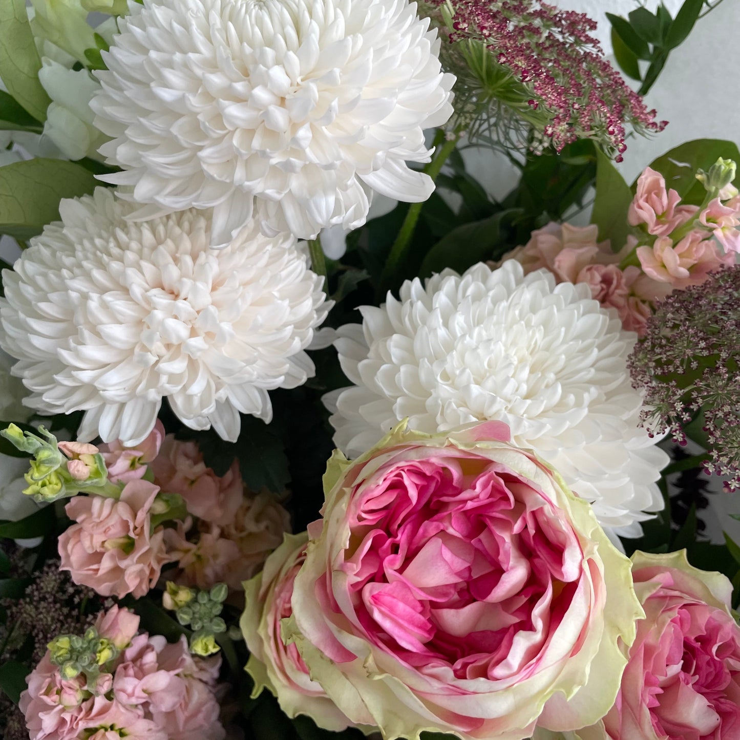 Abundant of fresh seasonal flowers designed in a glass vase. Delivered by Bendigo Florist Blumetown.
