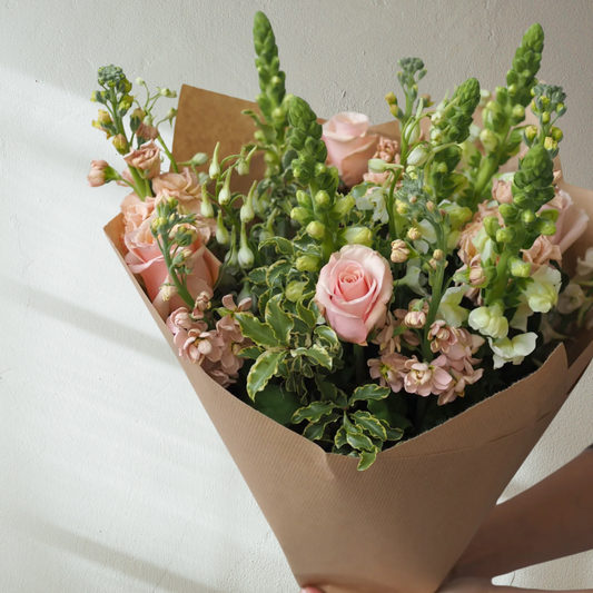 Abundant of fresh seasonal flowers wrapped with ribbon. Delivered by Bendigo Florist Blumetown. 