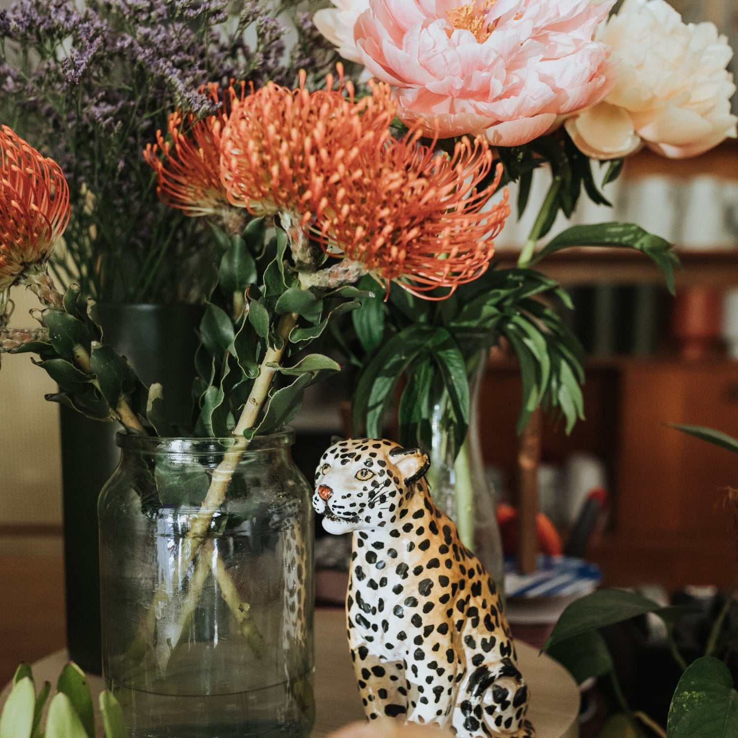 Florist display with ceramic leopard 