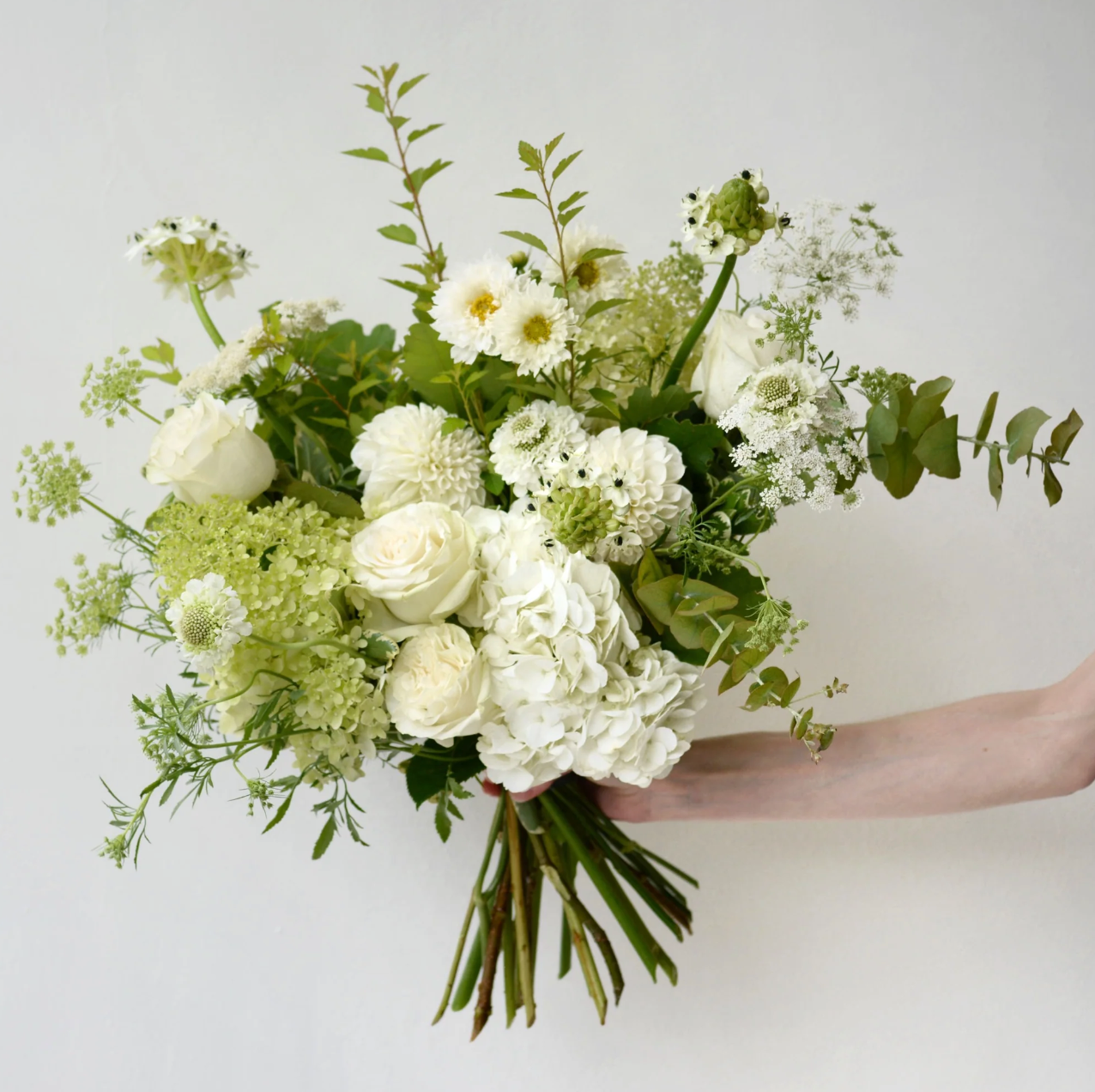 Bendigo Florist wrapped bouquet white, green flowers. 